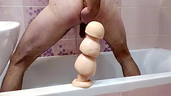 b. from huge anal dildo and hand fisting